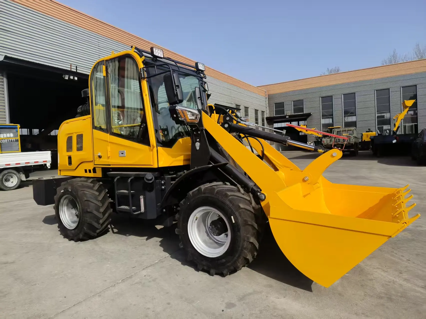 Micro boom loader, all terrain vehicle, articulated mobile processor, small wheel telescopic arm, front loader design, engine, l