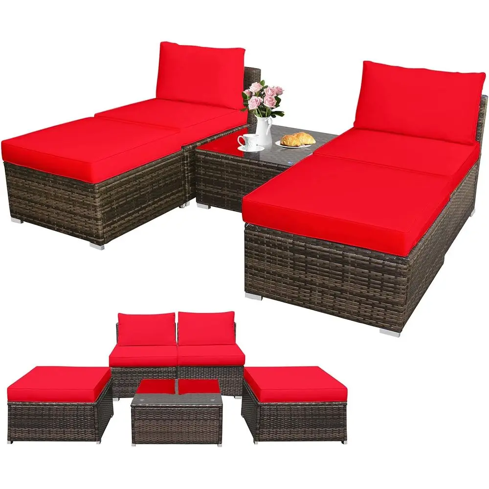 

Красный комплект садовой мебели из ротанга с креслами, пуфиками, стеклянным столом и подушками