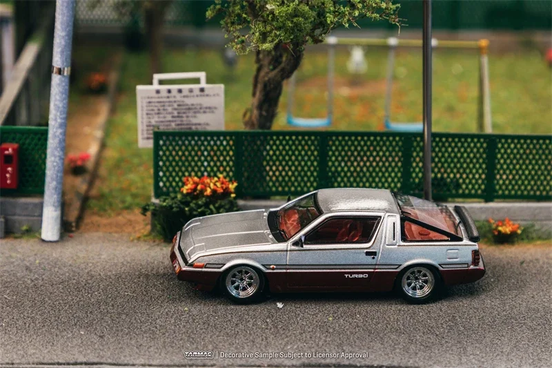 

Tarmac Works 1:64 Mit Starion Silver Dark red Model Car