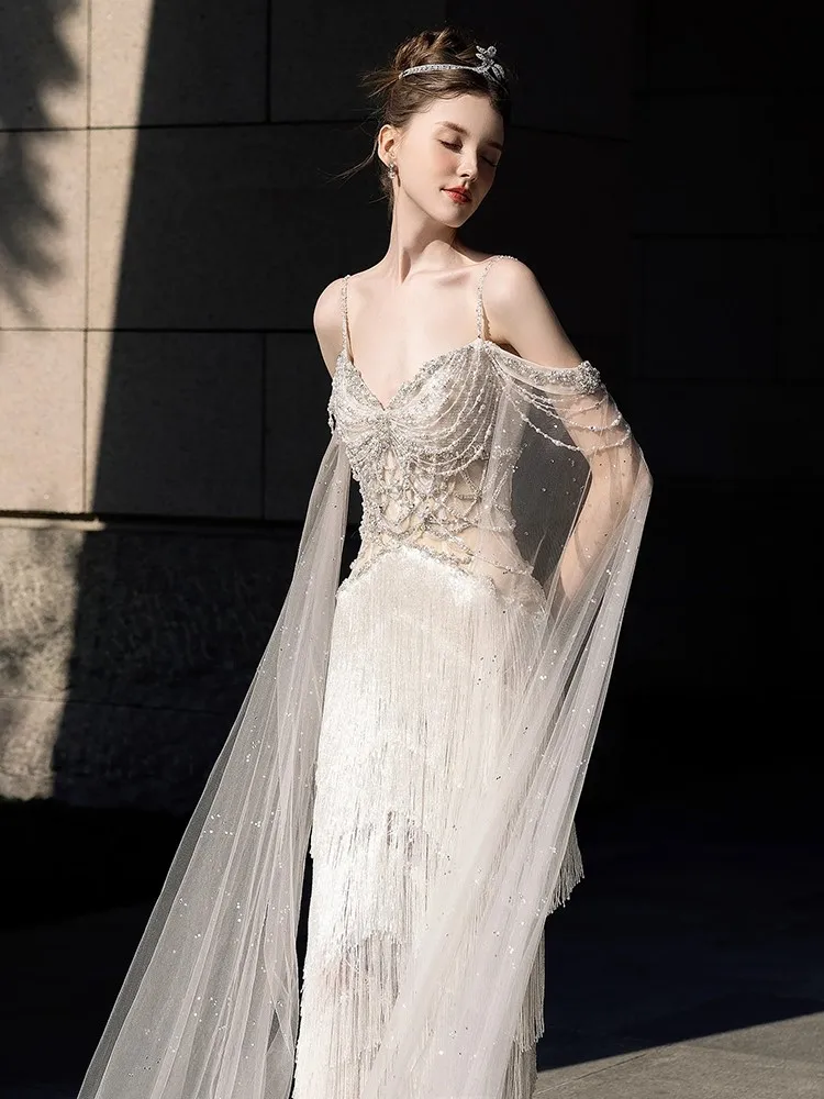 

A high-end fishtail dress with of luxury and light fringes