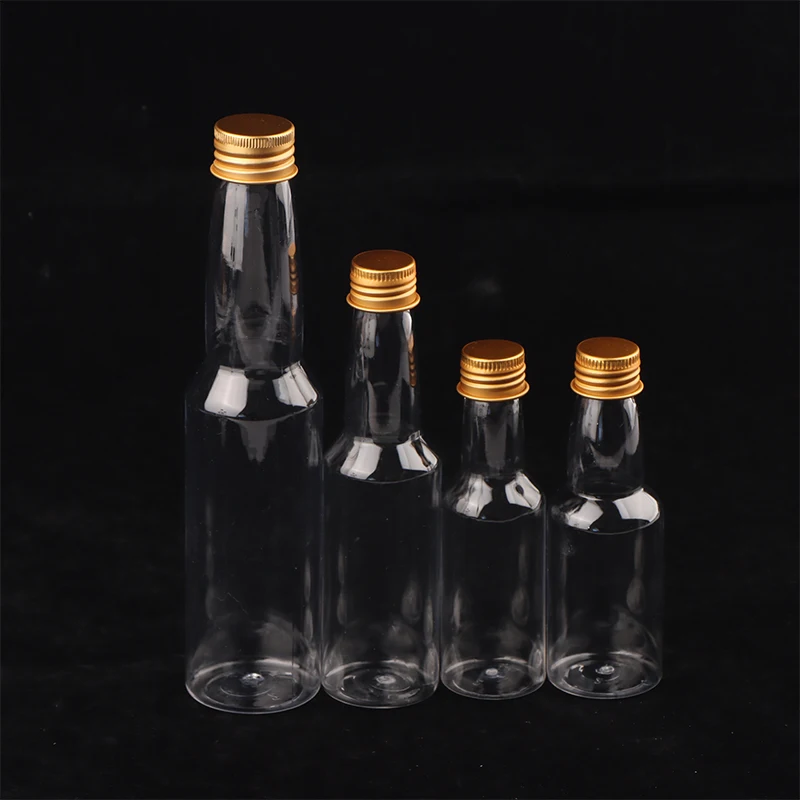 Bottiglie di spirito in plastica Mini bottiglie di liquore Mini bottiglia di colpo di alcol in plastica con tappo Bottiglia di latte Bottiglia di bevande trasparente