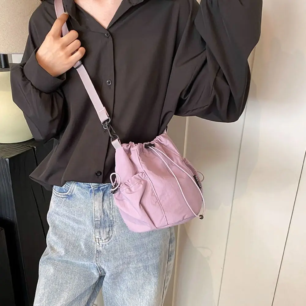 Korean Style Drawstring Bucket Bag Wrinkle Large Capacity Nylon Crossbody Bag Solid Color Adjustable Shoulder Strap Shoulder Bag