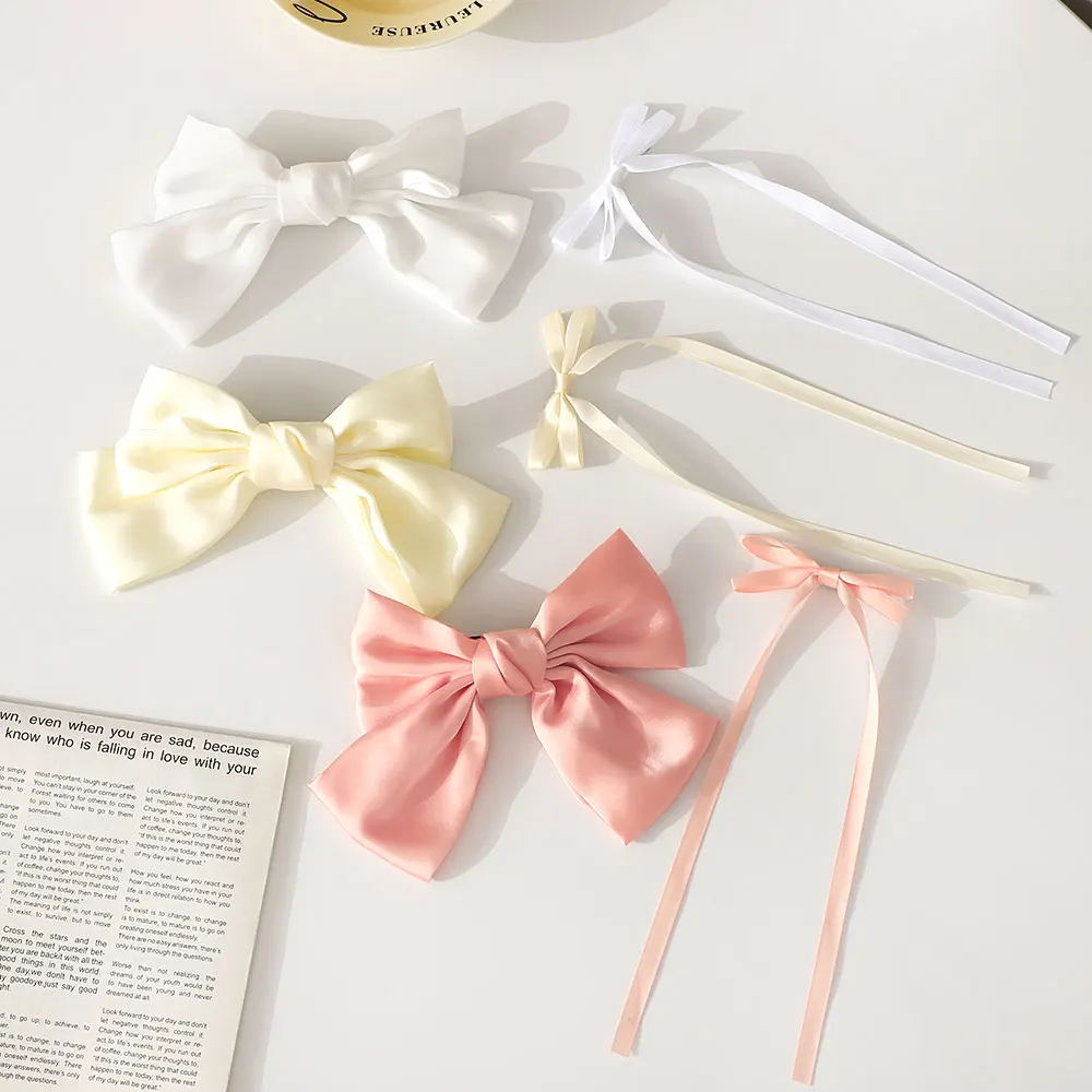 

2Pcs/Set Fashion Ribbon Bow Hair Clip for Women Y2k Style Long Satin Ponytail Bowknot Hairpins Barrettes Girls Hair Accessories