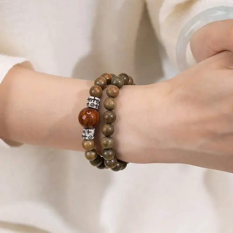 

Изысканный браслет-розарий из натурального старого зеленого сандалового дерева с бусинами Будды, с необычным фиолетово-золотым узором «Мышь», двойной круг, ручной работы