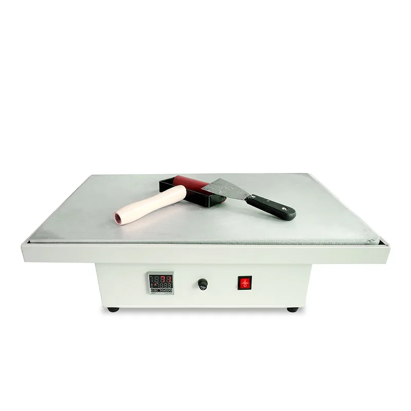 

JC-21 Simple and Small Manual Flat Roller Stripping Machine 38 * 38 Embroidery Factory Stripping Hot Melt Magic Film