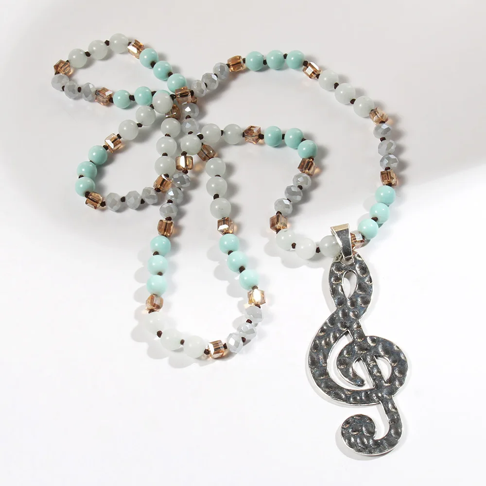 Wholesale cross-border personalized women's jewelry 8mm natural stone glass knotted necklace beating music note pendant necklace