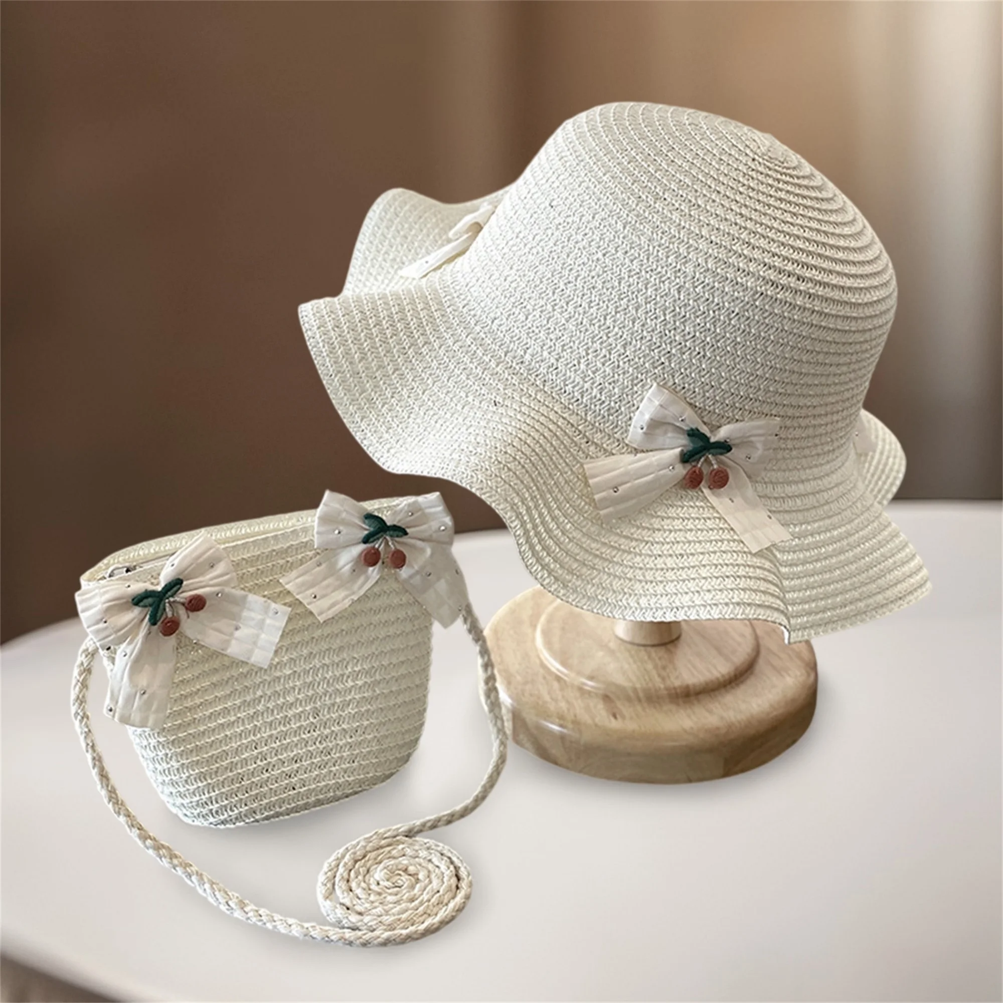 Niedlicher Eimerhut für Babys mit Blumendruck, stilvolle Strandkappe mit breiter Krempe und Sonnenschutz und passender Tragetasche