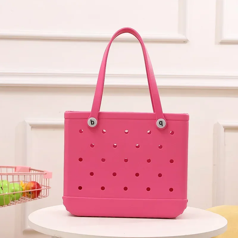 The trendy ladies bags are stylish and minimalist hollowed out candy colored portable vegetable basket bags handbags  bags