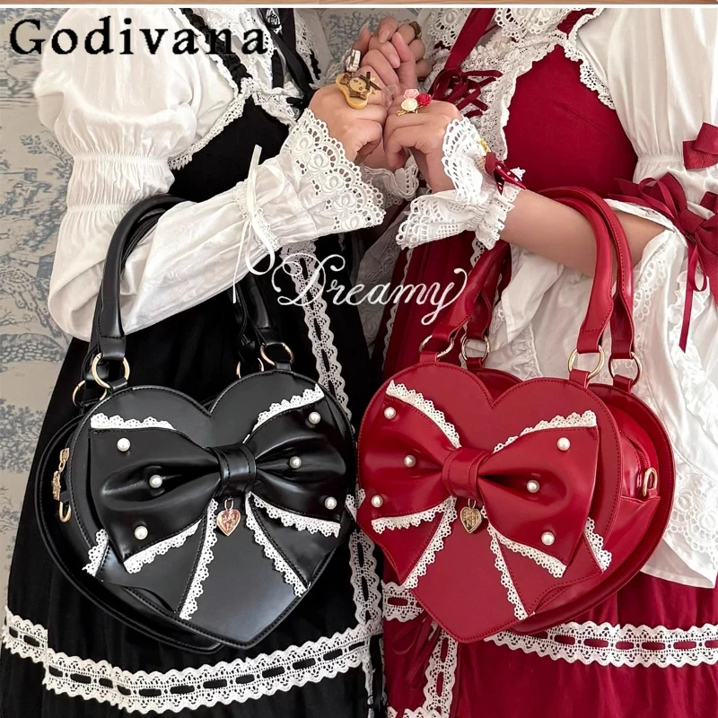 الفتاة الأميرة الحلو لوليتا شكل قلب حقيبة يد 2025 امرأة جديدة حلوة أنيقة القوس الكبير حقائب كروسبودي دمية يشعر حقيبة كتف