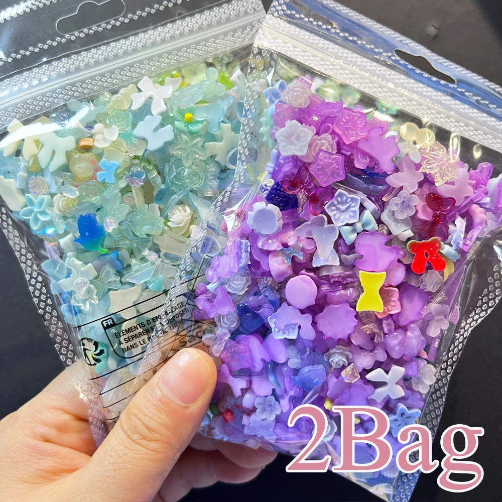 約 1000-1200 個混合ちょう結びフラワーネイルアートチャーム 2 バッグピンク/ブルー/パープル蝶椿ネイルパーツマニキュアアクセサリー