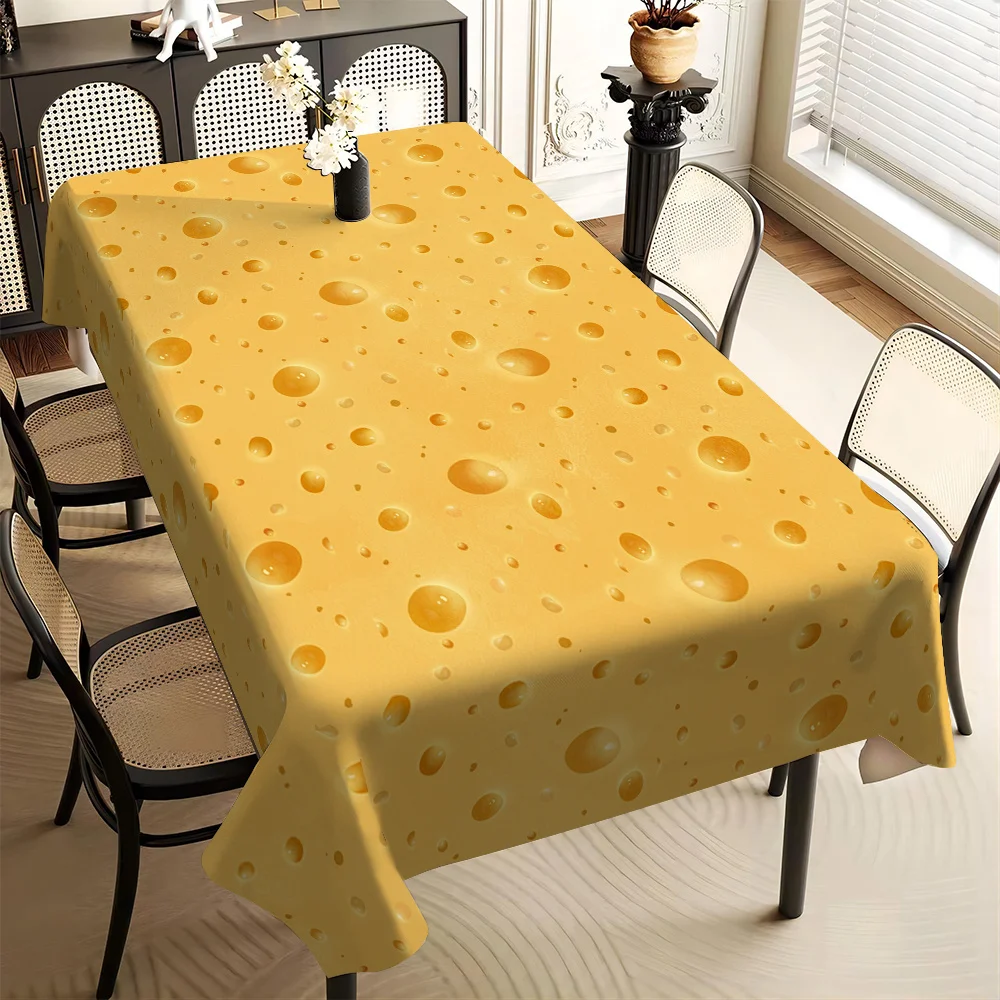 A polyester printed tablecloth with a fashionable cheese pattern, for party decoration