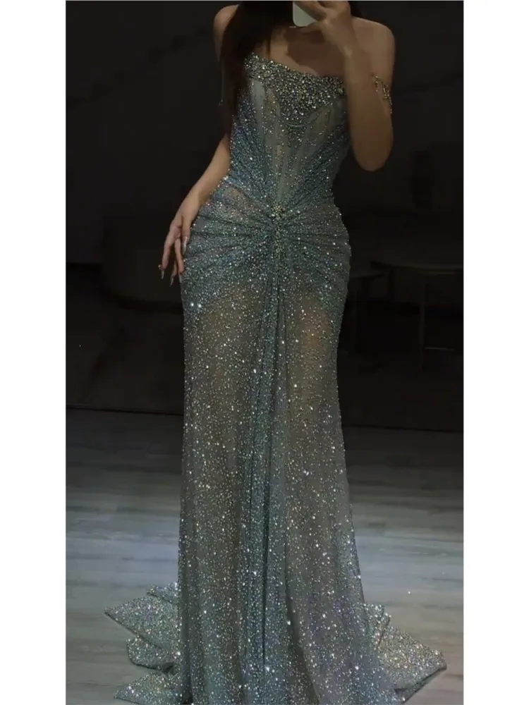 

A dress for the host of a heavy industry birthday party a toasting morning gown