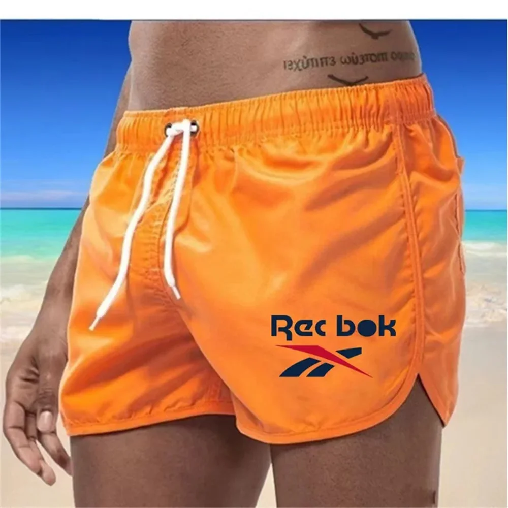 Summer fashion casual breathable quick drying ultra-thin best-selling beach shorts Men\'s swimming shorts + men\'s sports gym spor