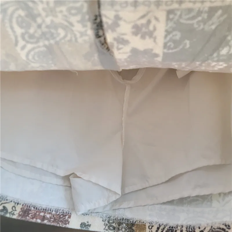 Estilo étnico casual retro flor impressão saia longa para as mulheres verão 2025 moda cintura alta emagrecimento a linha saia curta com cinto