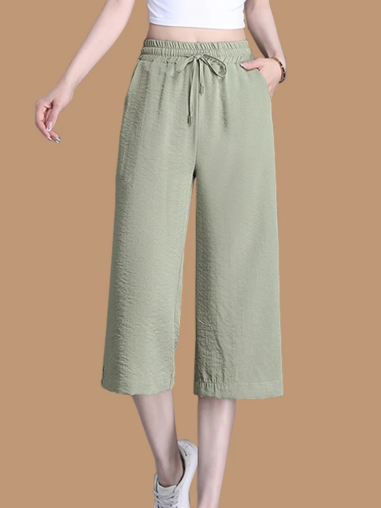 กางเกงขายาวทรงหลวมสำหรับฤดูร้อน ผู้หญิงไซส์ใหญ่ เอวสูง ความยาวเจ็ดส่วน สไตล์ลำลอง เหมาะสำหรับคุณแม่วัยกลางคน