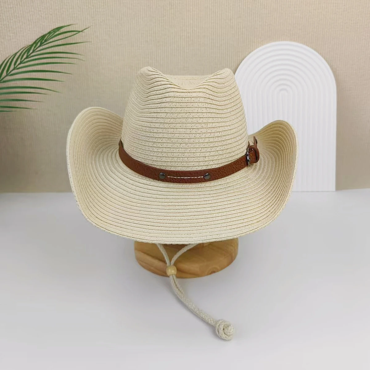 A men\'s and women\'s wide-brimmed western cowboy hat stylish jazz hat, summer beach sun hat carrying a windbreak rope