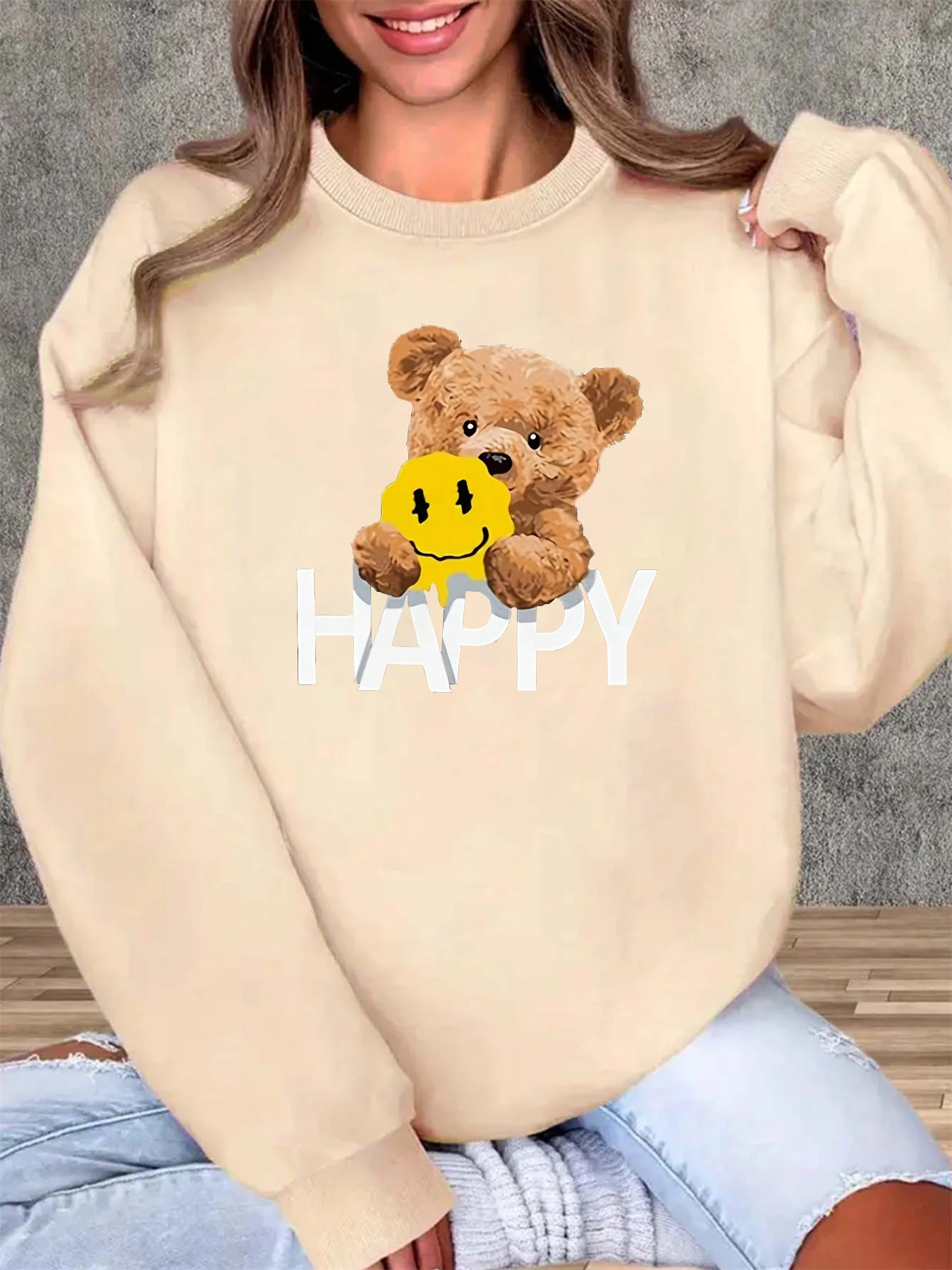 Damska jesienno-zimowa luźna i wygodna ciepła bluza z okrągłym dekoltem, długim rękawem i nadrukiem z motywem misia HAPPY.