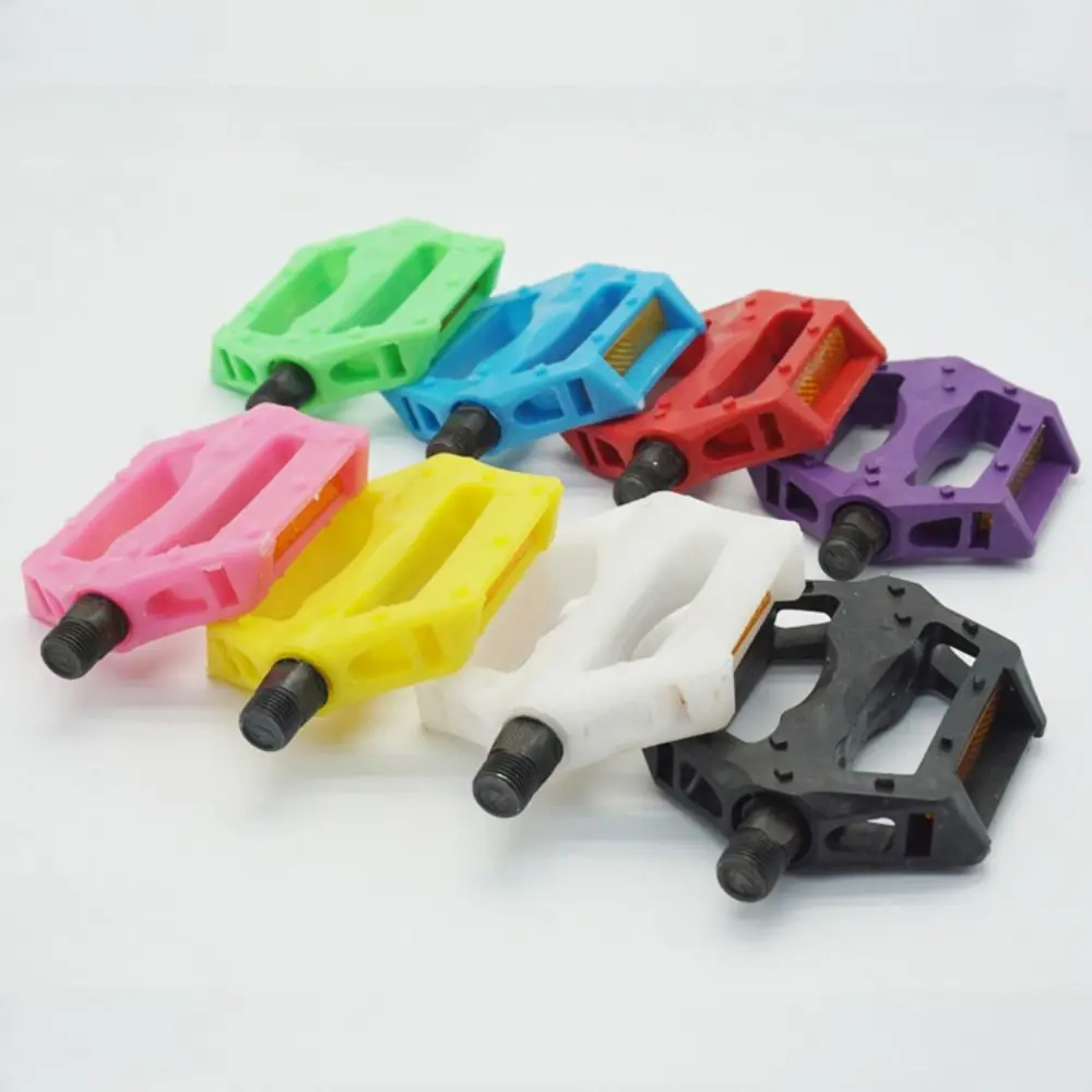 Pedales de bicicleta de plataforma anchos coloridos de plástico