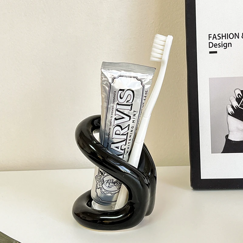 Ceramic Knot-tied Electric Toothbrush Storage Rack Decoration New Bathroom Creative Washbasin Makeup Pen Toothpaste Storage Rack