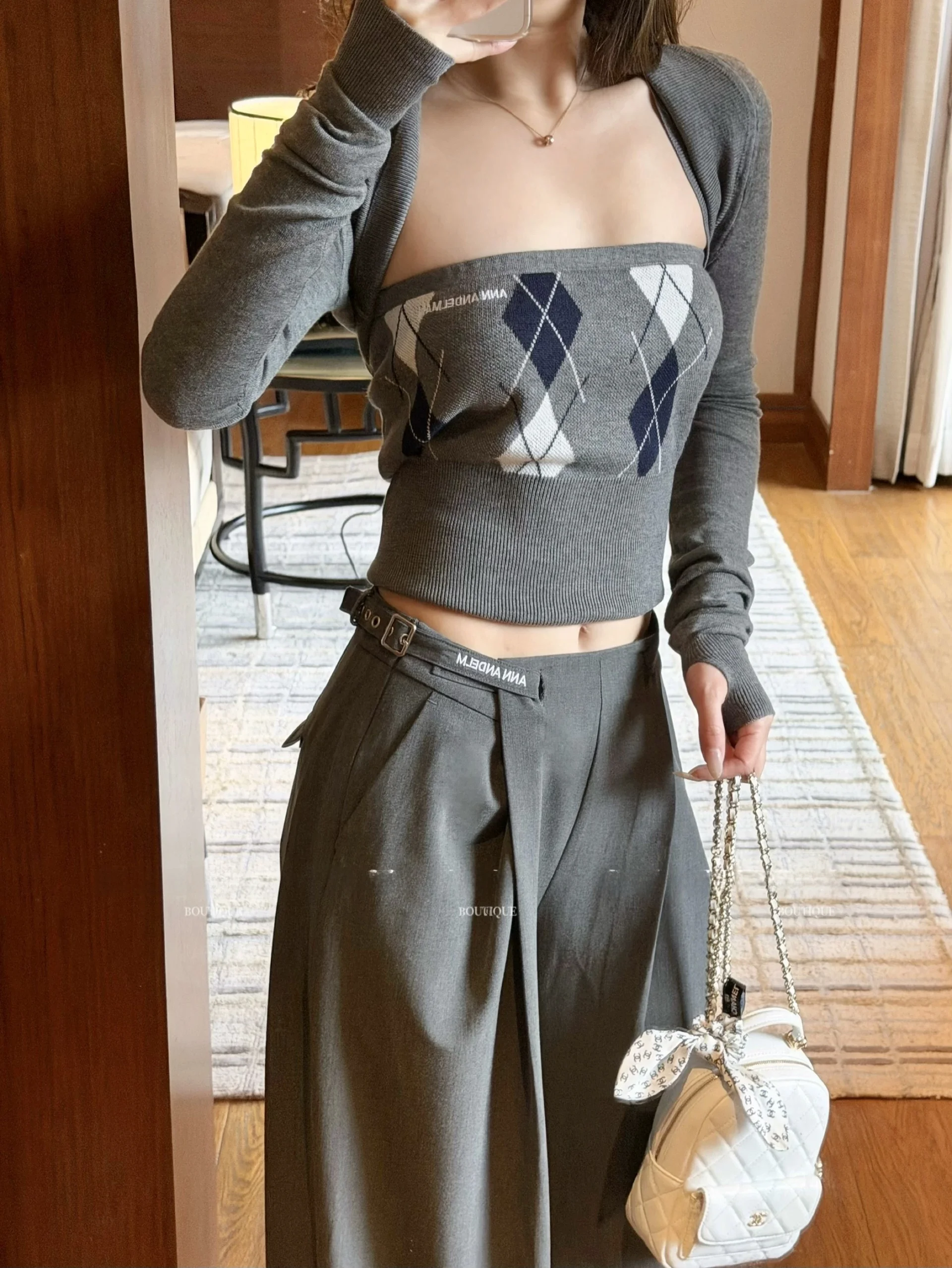 

Ретро-комплект из укороченного топа и вязаных брюк с длинными рукавами, новый дизайн для ранней весны, женский трикотажный костюм.