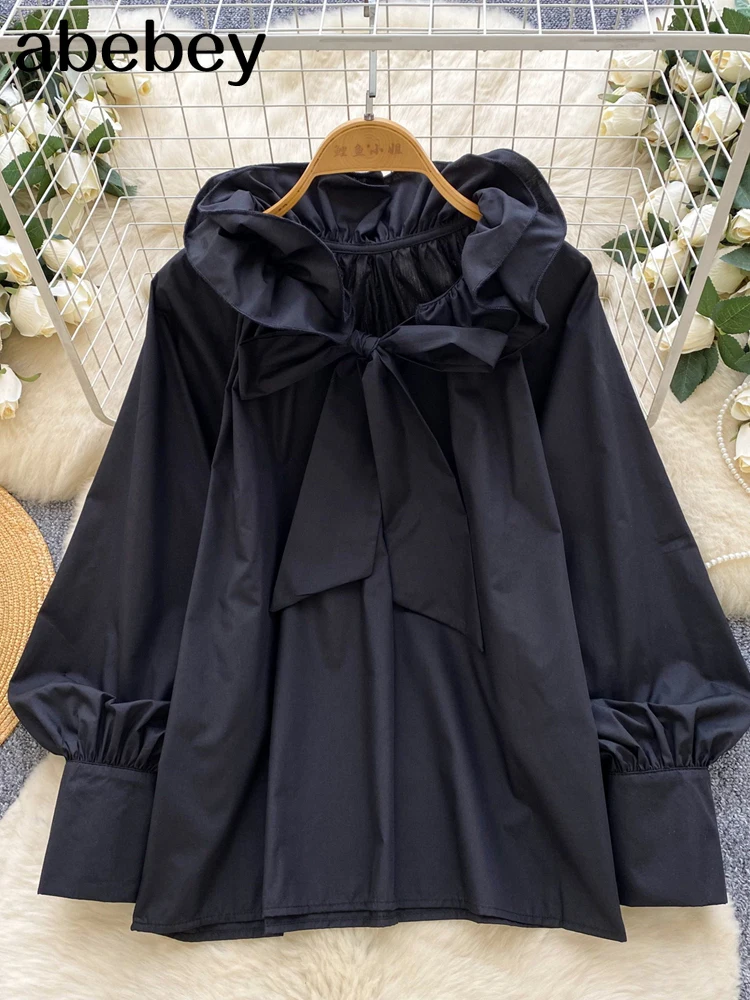 Elegancka bluzka z falbankami, stójką, długim rękawem i motywem motyli, w stylu vintage, luźna, francuska, idealna do biura, w stylu high street, na jesień 2026.