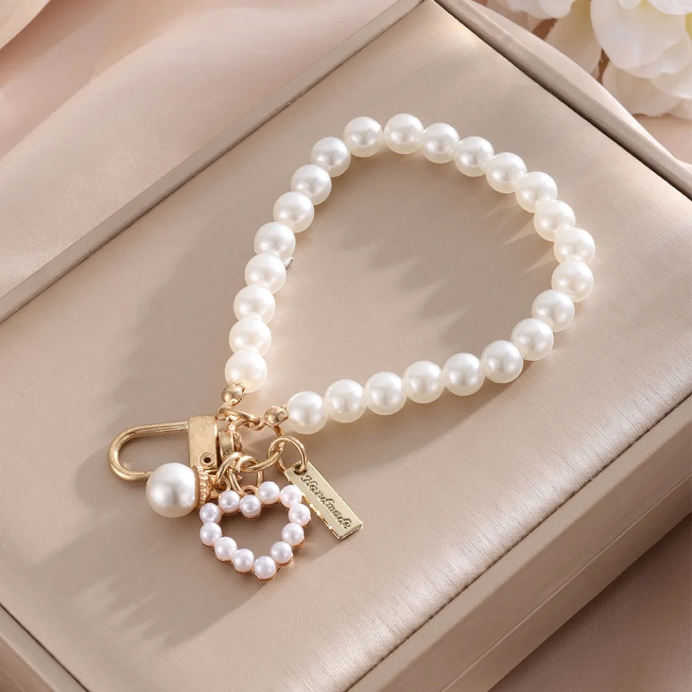 Nouveaux porte-clés perlés dorés, cordon de suspension tendance pour femmes, pendentif pour téléphone portable, porte-clés de voiture, cadeaux d'anniversaire