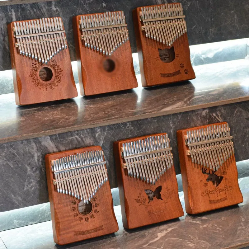 

Finger Piano 17-key Portable Five-finger Piano Kalimba Piano Peach Blossom Core Finger Piano 21-tone Set Mini Thumb Piano