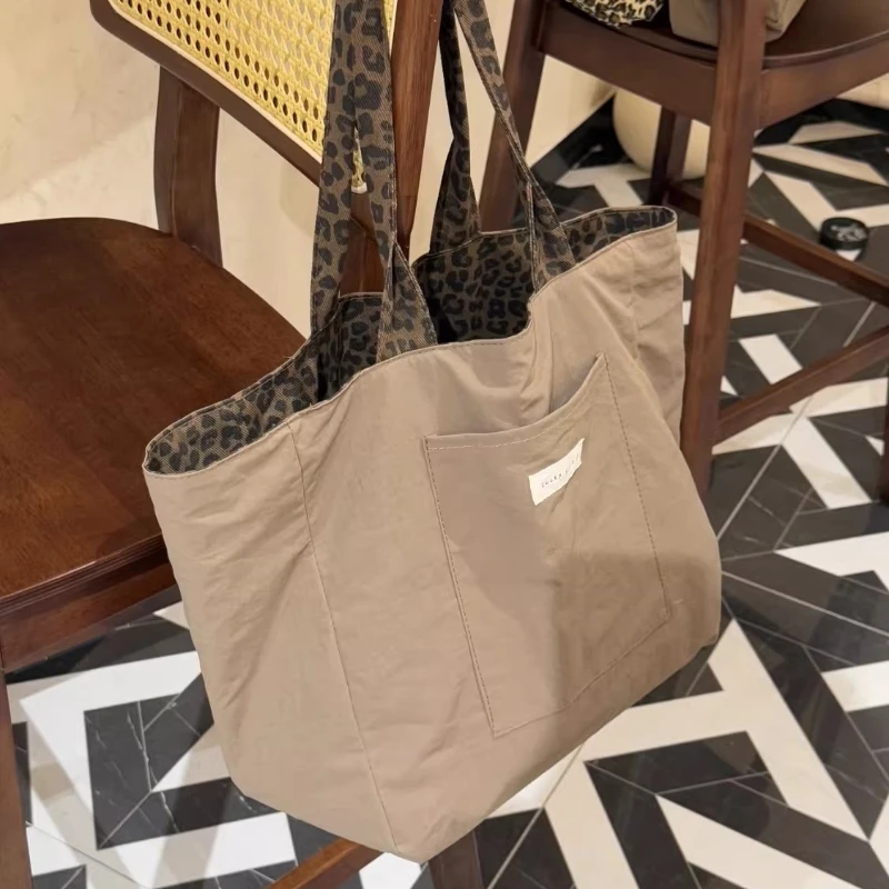 

Leopard-print Double-sided Use Canvas Bag Women's Large Capacity Commuter Shoulder Bag 2026 Purses and Handbag