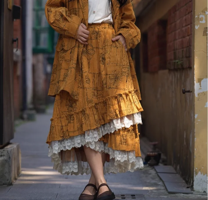 Autunno Inverno Moda Retro Velluto a coste Colore zucca Dolce pizzo Stampa Gonna Ragazza Versatile Riduzione dell'età Ruffles Gonne irregolari