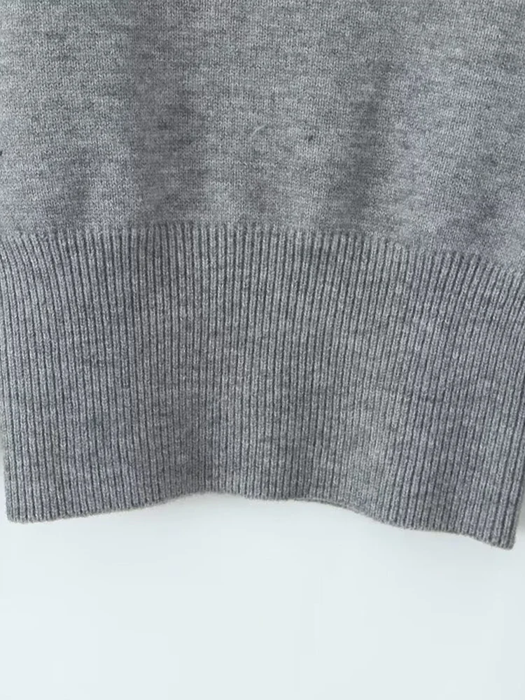 Jesienny nowy damski sweter w stylu francuskim retro, prosty, modny, z długim rękawem, seksowny, z odkrytym ramieniem lub bez ramiączek.