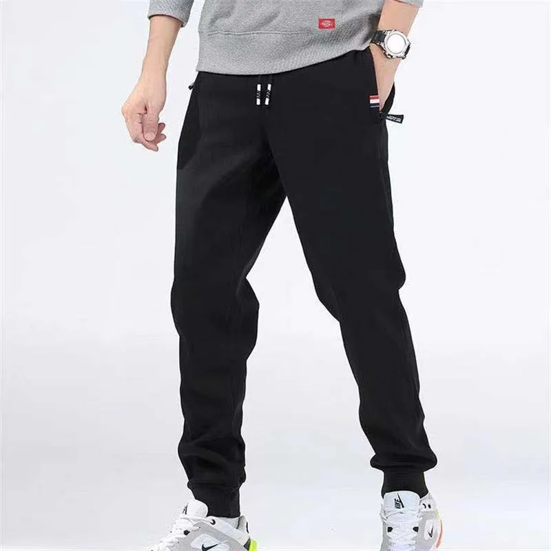 Pantaloni Casual caldi in lana d'agnello invernale pantaloni sportivi da Jogging Fitness da uomo pantaloni dritti in pile con coulisse solidi maschili M-5Xl