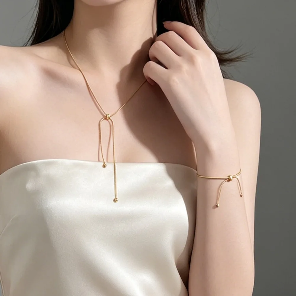 2-Piece Set of Minimalist and Elegant Faux Gold Knot Necklaces and Bracelets for Business Commuting, Workplace Meetings, Art Exhibitions, Bookstore Leisure, Art Exhibitions, Bookstore Leisure, Knot Necklaces, Minimalist Jewelry Sets, Gift Jewelry Sets, Women's Accessories, Niche Design Necklaces