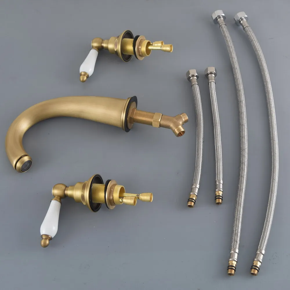 

Винтажный ретро-смеситель для раковины из античной латуни с двумя ручками, для установки на столешницу, с 3 отверстиями, для ванной комнаты, модель man078