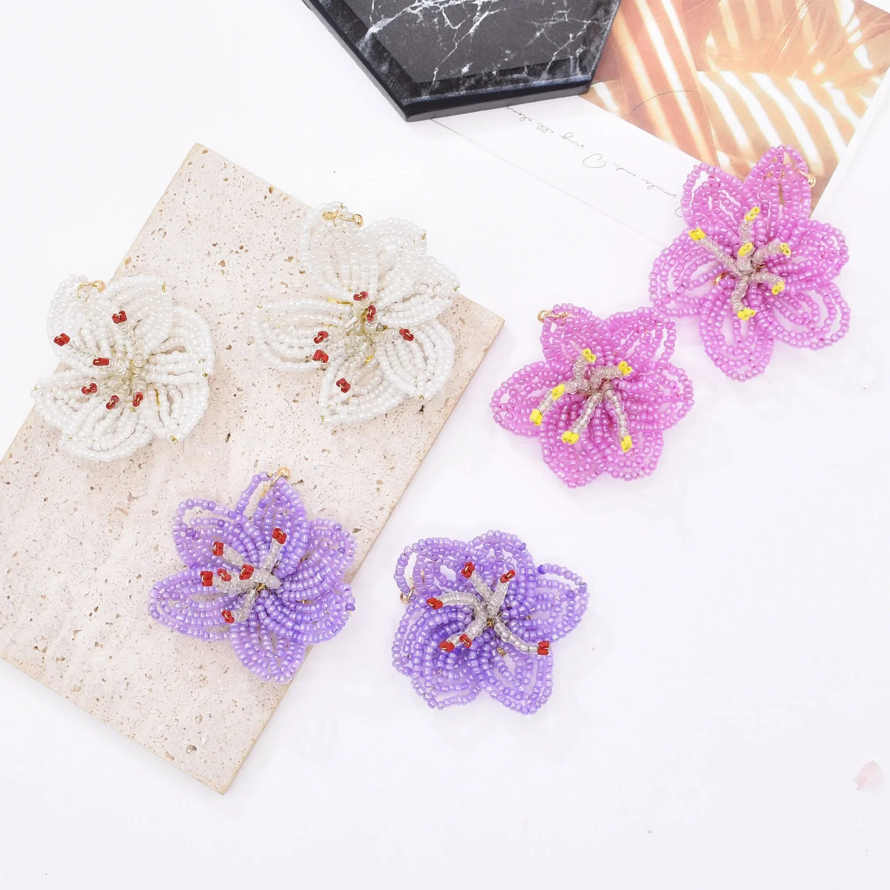 

Rice bead earrings Originality Hand knitting Three-dimensional Flower Fashion Simple Hand knitting Bohemia Alloy Beaded earrings