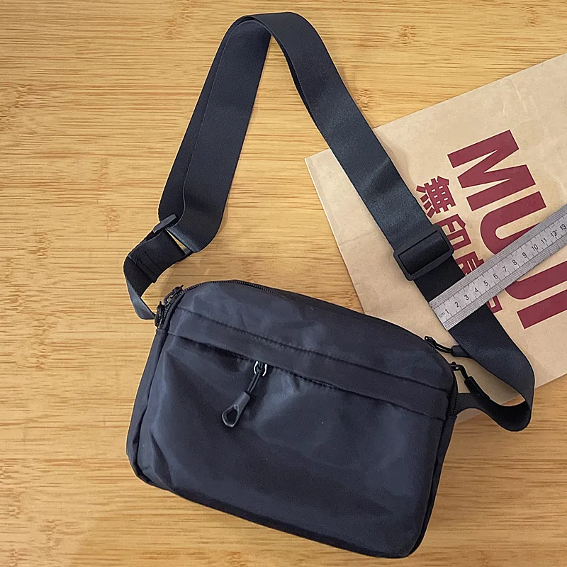 

Новая сумка через плечо из ткани Оксфорд: простая и повседневная, с широким плечевым ремнем, большой вместимости, унисекс, для поездок на работу.