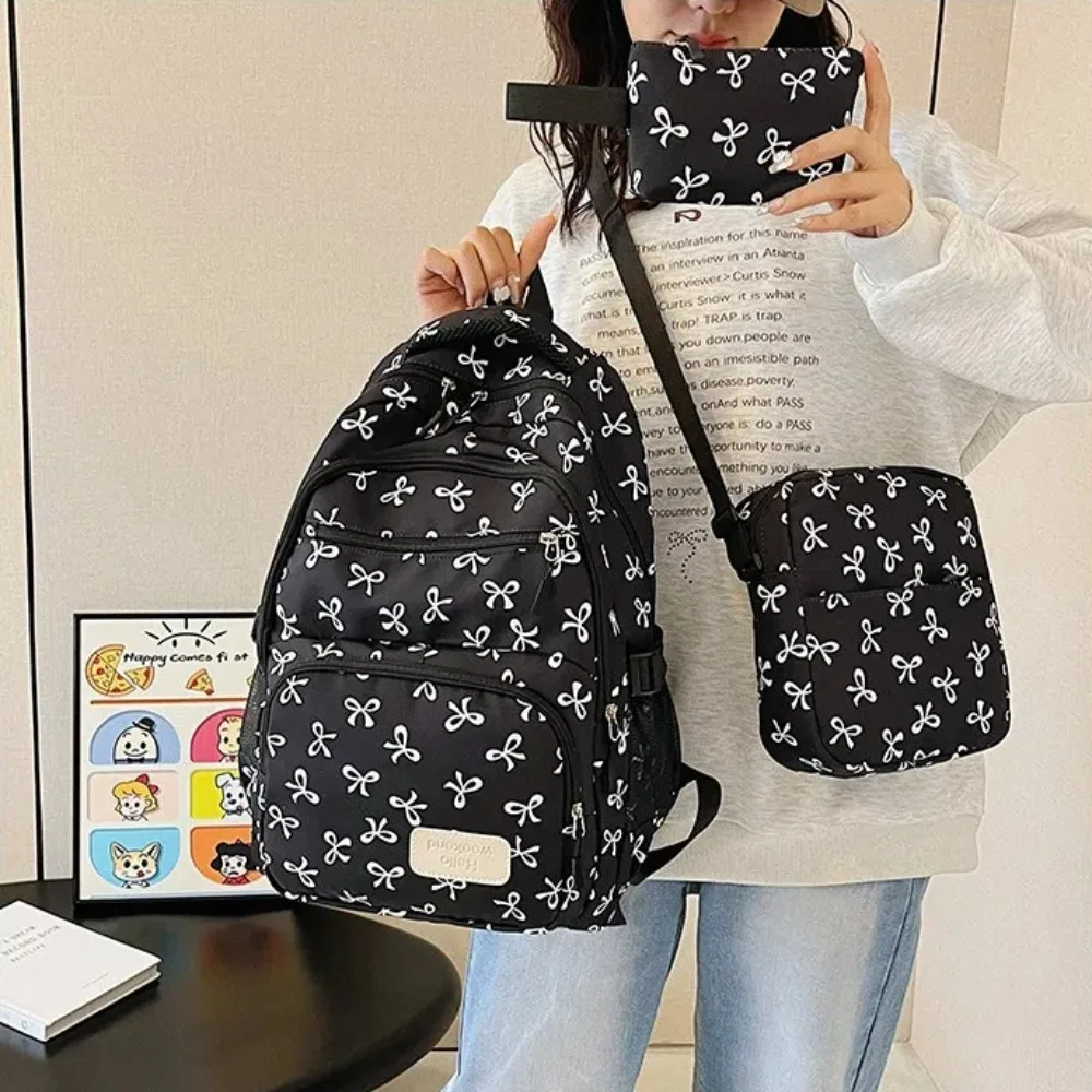 3 قطع/مجموعة حقيبة ظهر لطيفة ذات سعة كبيرة على شكل فيونكة من النايلون بحزام قابل للتعديل حقيبة ظهر للطلاب مطبوعة على شكل فيونكة حقيبة سفر