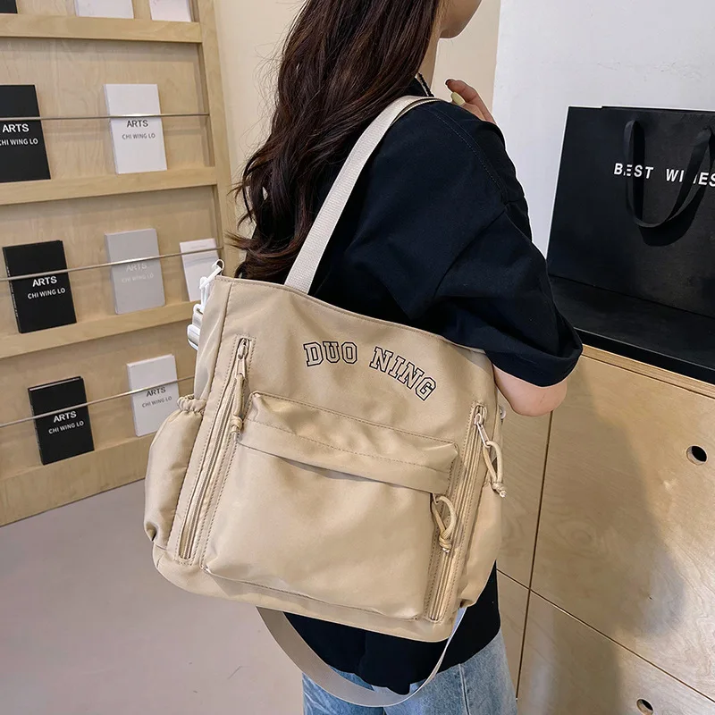 

Student Bag Fashion Letter Print Large Capacity Durable Canvas Shoulder Bag Boys Girls Vintage Chic Outdoor School Crossbody Bag