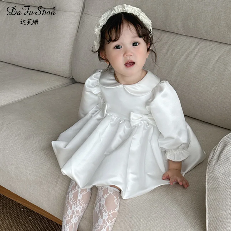 فستان موري أبيض للربيع والخريف للفتيات على الطراز الكوري ملابس أطفال أوائل الخريف بأكمام طويلة جديد مطوي من الدانتيل L