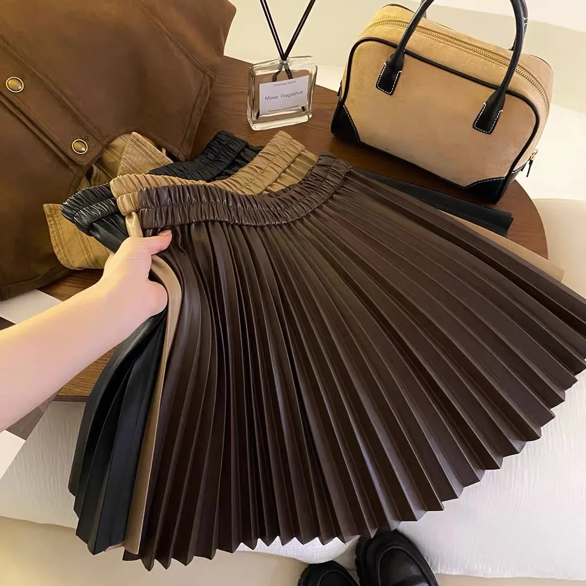 

Girl Spring and Autumn PU Leather Pleated Princess Short Skirt Korean Elastic High Waist A-line Black Small Leather Skirt