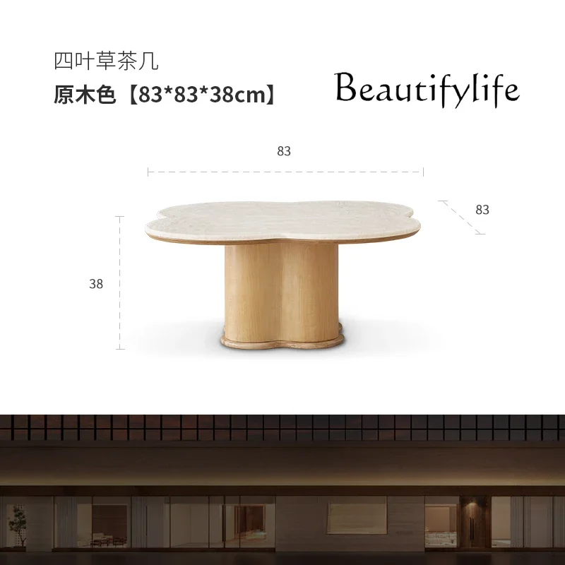 

Light luxury French retro small apartment living room coffee table wabi sand wind designer special-shaped travertine