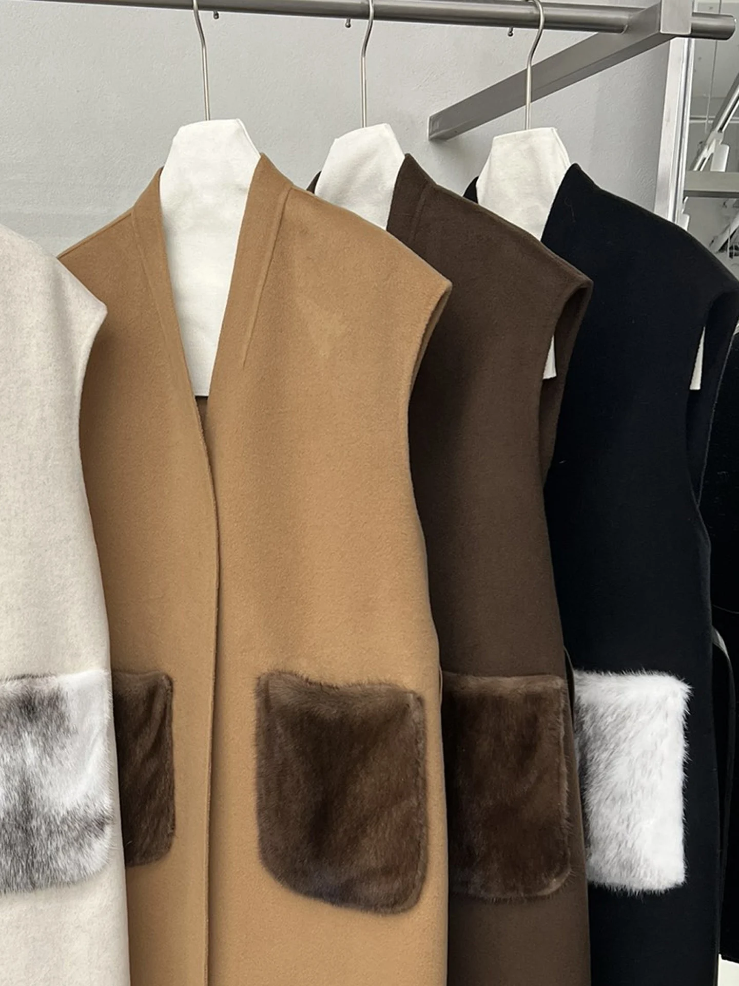 고품질 캐시미어 울 조끼, 중간 길이 밍크 포켓 타이 웨이스트 중간 길이 민소매 양면 울 가디건