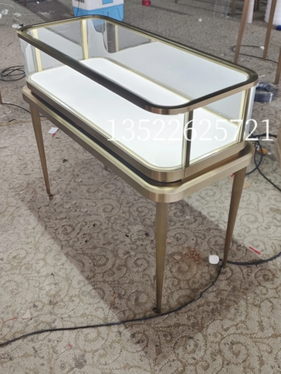 Custom.High-end Customized Stainless Steel Jewelry Display Cabinet, Luxurious Rose Gold Showcase, for Jewelry Store Display.