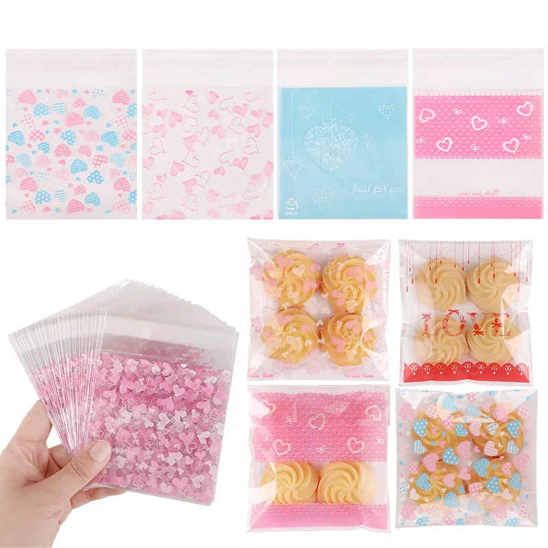 50/100 Stück transparente Herz-Süßigkeitenbeutel aus Kunststoff, selbstklebende Beutel zur Schmuckaufbewahrung für Partys, Hochzeiten, Geburtstage, Geschenkverpackungen.