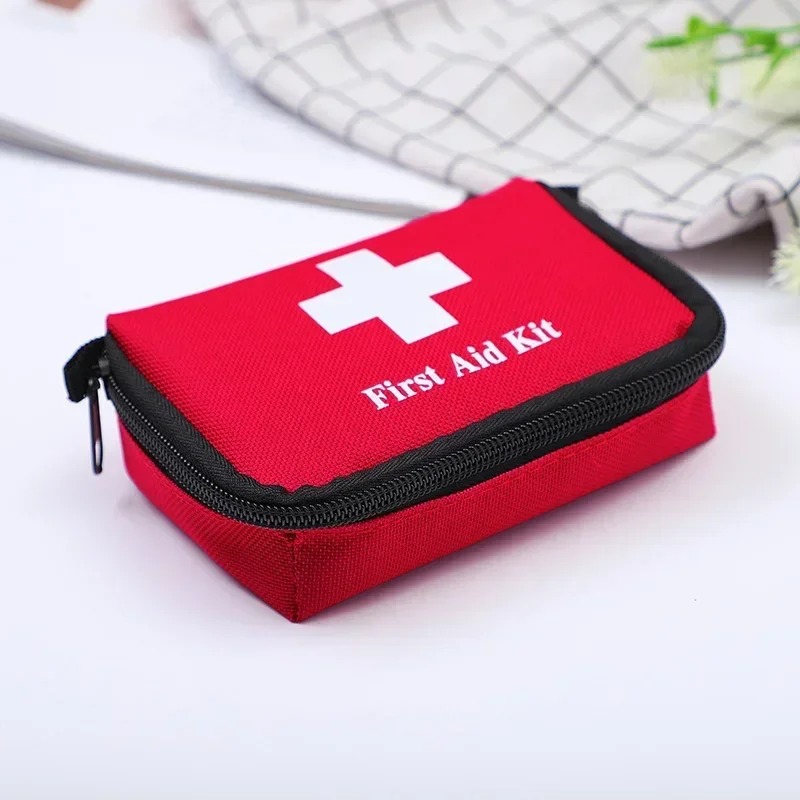 

Portable Travel First Aid Kit Outdoor Camping Emergency Medical Bag Bandage Band Aid Survival Kits Self Defense