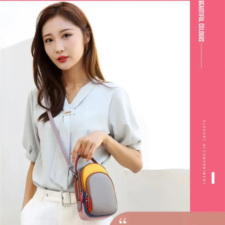 

Leather mobile phone storage, hand-held crossbody bag with top layer cowhide color contrast, large capacity single-shoulder bag