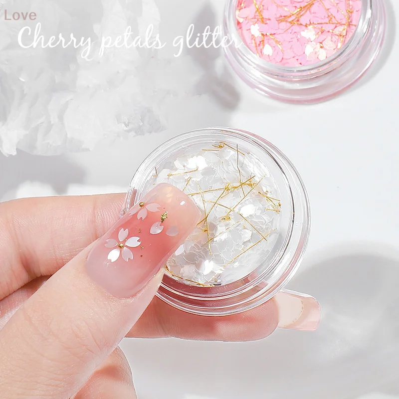 1 scatola Sakura Petalo di fiore Fascino per unghie 3D Fiori di ciliegio Fette Perline in acciaio dorato Decorazione per unghie Primavera Manicure Paillettes