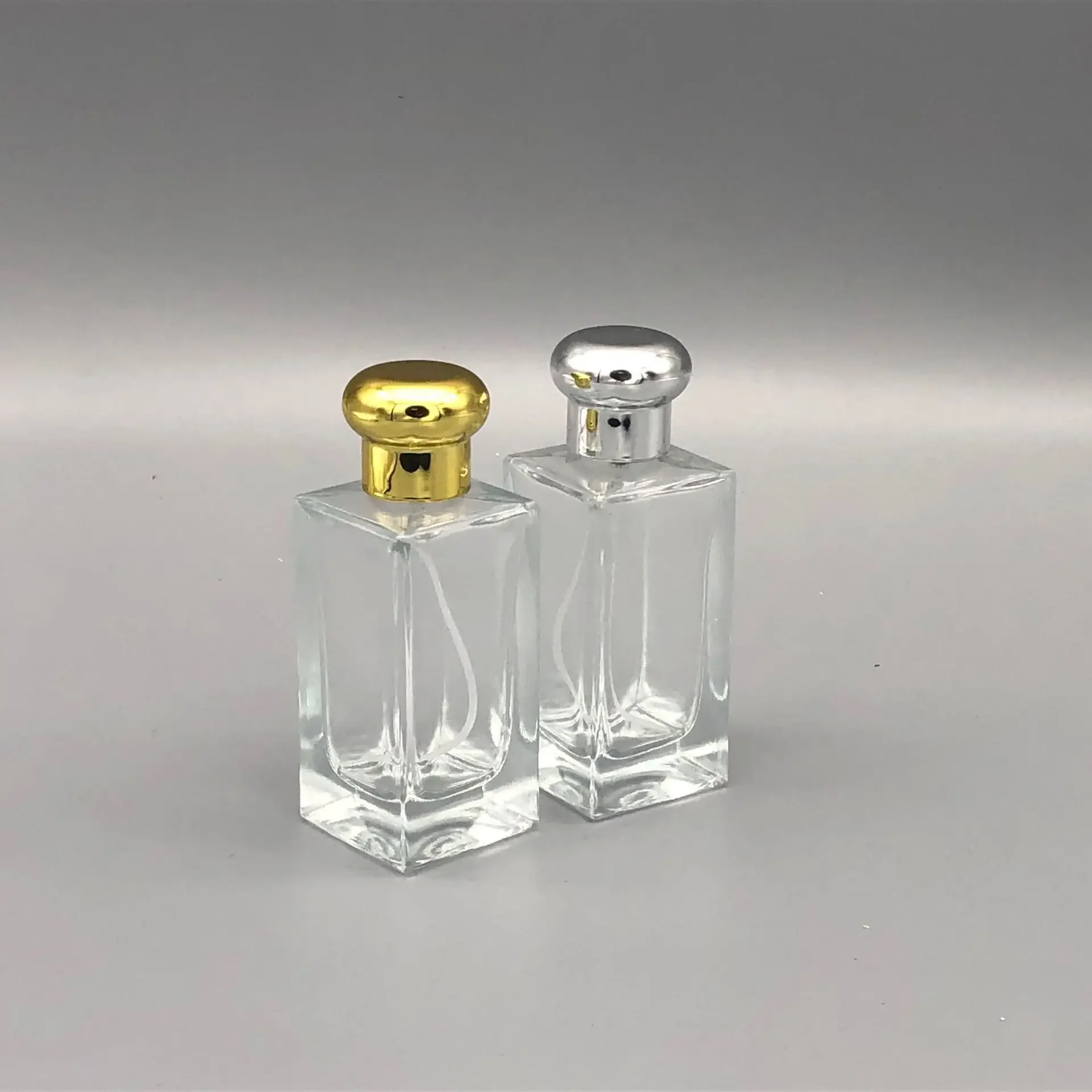 50ML gold round cap high-end perfume bottle portable perfume refill bottle exquisite cosmetic spray bottle glass bottle makeup