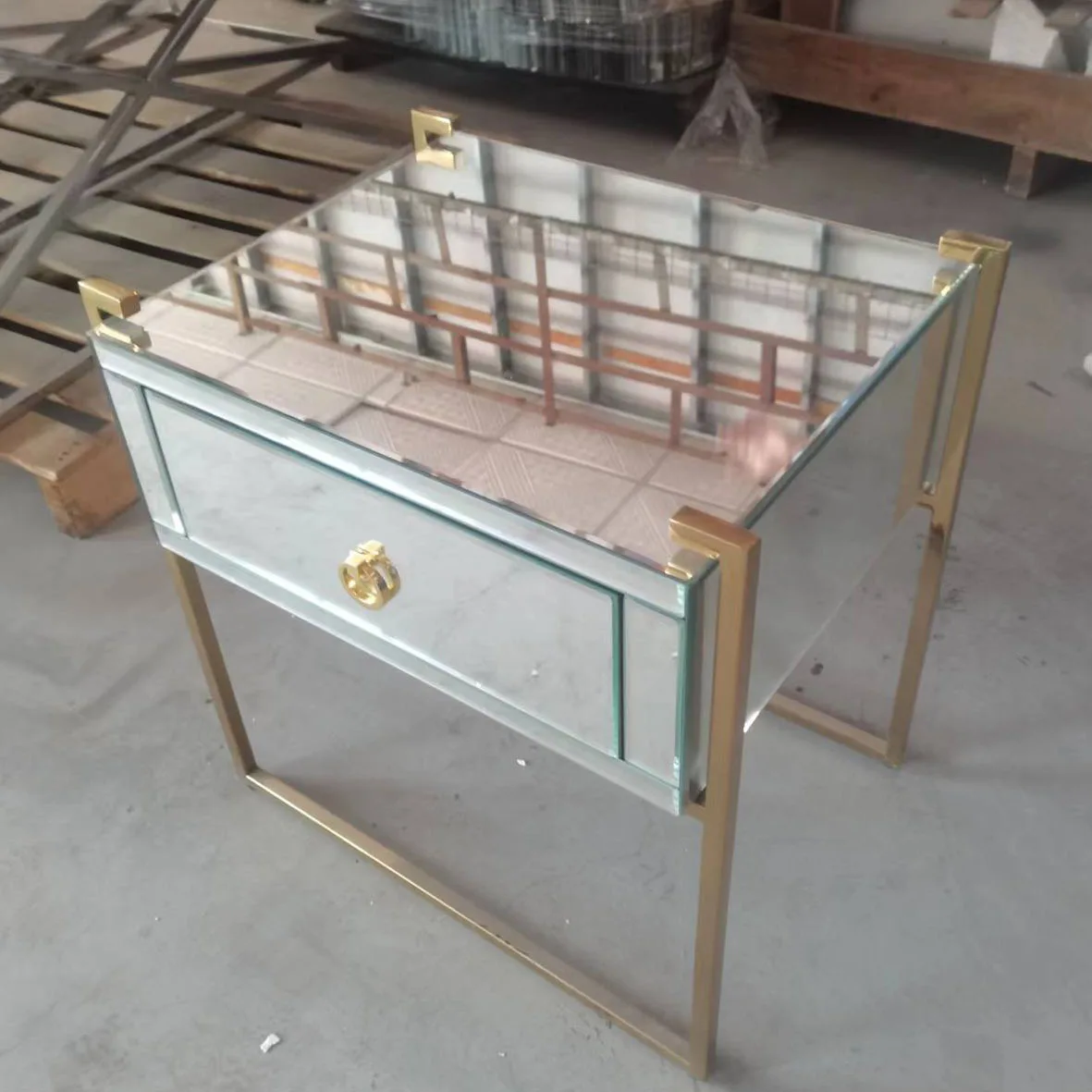 

Modern light luxury gold stainless steel mirror glass bedside table
