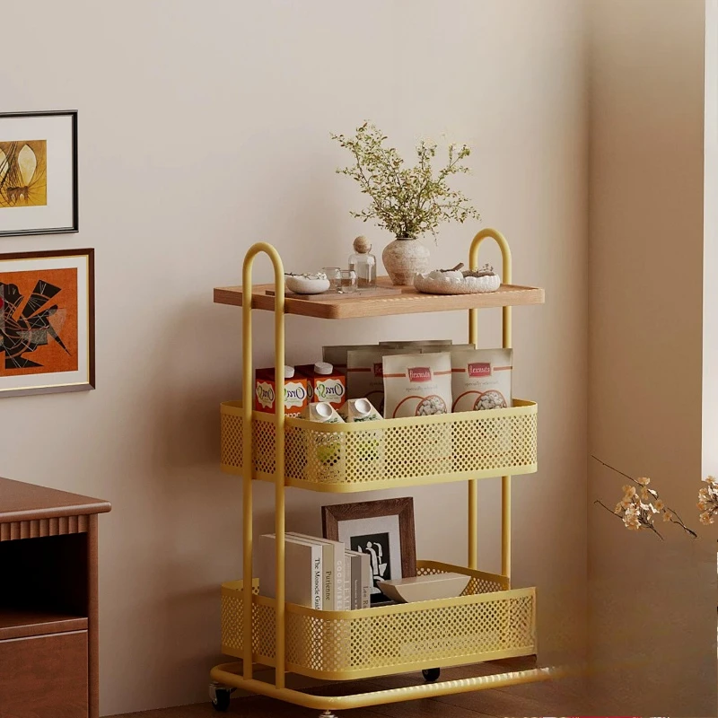 A few snacks next to the sofa in the living room, multi-functional movable trolley