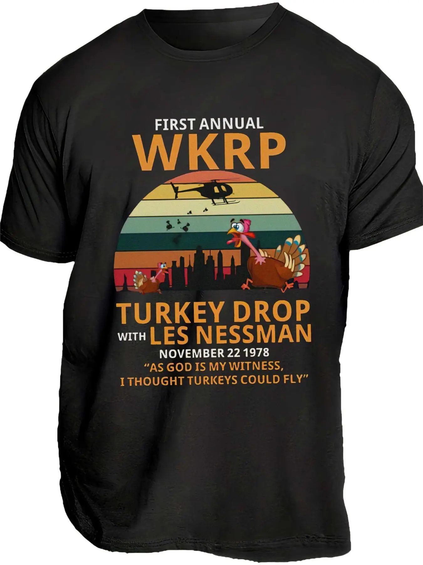 Retro Styled First Annual WKRP Turkey Drop T-Shirt - Vintage 70s Inspired Graphic Tee with Helicopter, Sunset Design, and Iconic Quote - Perfect for Thanksgiving Celebration and Nostalgic Fans